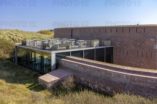 Restaurant with terrace at Fort Napoleon, polygonal fort of the Napoleonic era in the dunes at Ostend, Oostende, West Flanders, Belgium