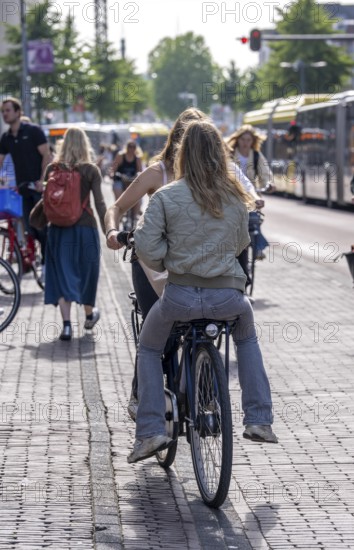 Cycling in the Netherlands, Utrecht, typical riding style with 2 people on one bike