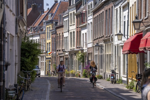 Old town centre of Utrecht, Haverstraat, small side street with houses and small shops, Netherlands