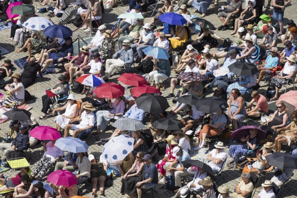 Visitors at the Staatsoper fÃ¼r alle, a free open-air concert with conductor Christian Thielemann and the Staatskapelle Berlin on Berlin's Bebelplatz, Berlin, 22 June 2025