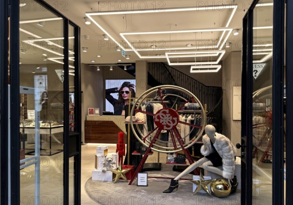 View from outside of a shop owned by the American clothing company GUESS, Noble Fashion Store, City Center, Düsseldorf, Germany