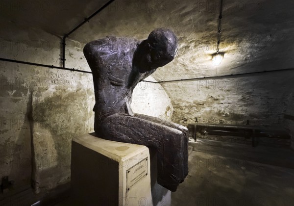 Artwork entitled Victim by Thomas Duttenhöfer, Historischer Luftschutzkeller, Mahn- und Gedenkstätte, Düsseldorf, Germany