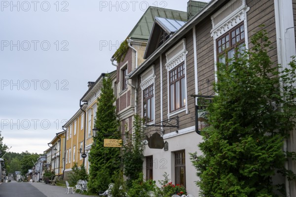Street scene in the old town of Naantali, quiet street with historic buildings and lots of greenery, a peaceful part of the old town, Naanatali, Varsinais-Suomi, Finland
