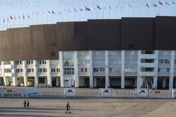 Olympic stadium with flags on the roof, architects Yrjö Lindegren and Toivo Jäntti, Helsinki, Finland
