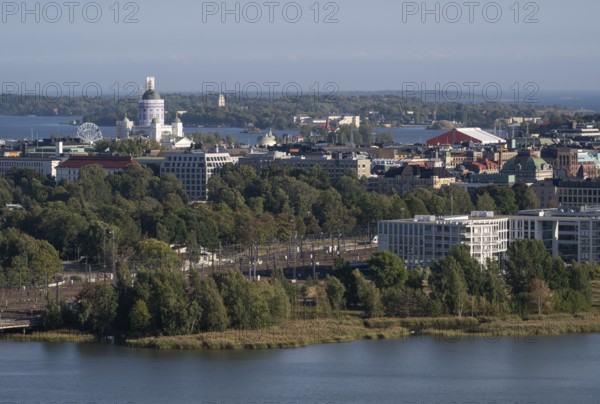 View from the Olympic Stadium tower across Lake Töölönlahti to the city center and port of Helsinki, Finland