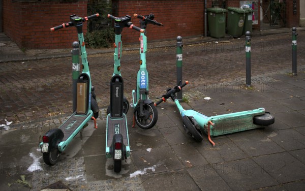 E-scooters, electric scooters, scooters parked and carelessly left lying on the side of the road in the DOTT and SWAP bike rental companies!, Stuttgart, Baden-Württemberg, Germany