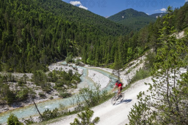 Isar cycle path to Isar origin in Hinterautal, mountain biker on the upper reaches of the Isar, Karwendel, Alps, Tyrol, Austria