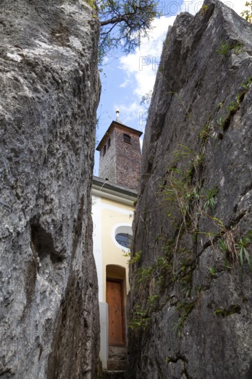 Maria Klobenstein pilgrimage church, view through crevice, Kössen, Austria