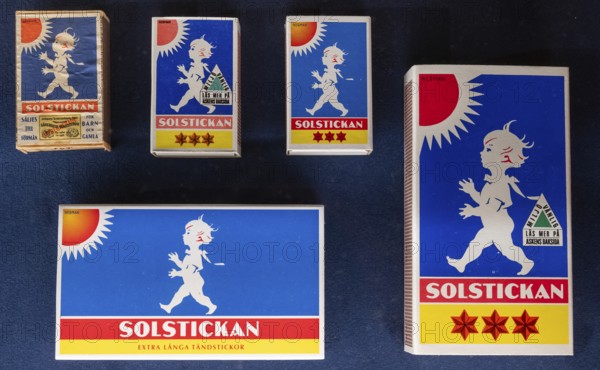 Matchboxes with traditional label motif Stolstickan or Solstickepojken, Sun Boy, designed in 1936 by Einar Nerman, Tändsticksmuseet Match Museum or Match Museum, Jönköping, Jönköpings län, Sweden