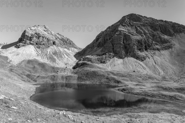 The Rappensee (also Großer Rappensee), a Bavarian high mountain lake at 2047m, behind it Hochgundspitze, 2459m, and Rappenseekopf, 2468m, Allgäu Alps, Allgäu, Bavaria, Germany