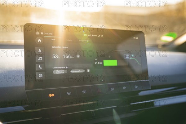 Modern car display provides information about fast charging, embedded in stylish interior, MG4 electric car, Deer e-Carsharing, Calw, Germany
