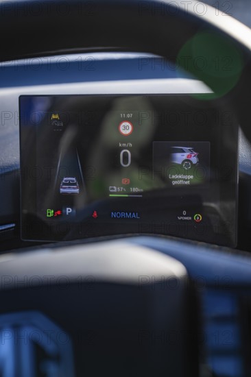Electronic dashboard shows driving information and battery status in a modern car, MG4 electric car, Deer e-Carsharing, Calw, Germany