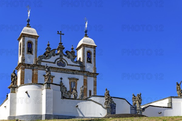 Historic baroque church facade in the Bom Jesus do Matosinhos sanctuary with the twelve prophets by Aleijadinho in the city of Congonhas, Congonhas, Minas Gerais, Brazil