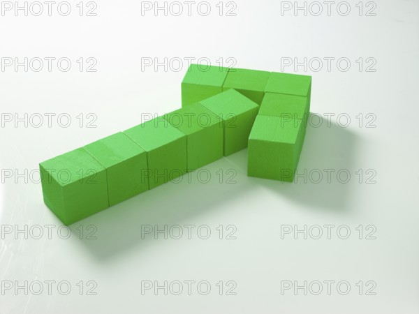 10 green wooden cubes against a white background