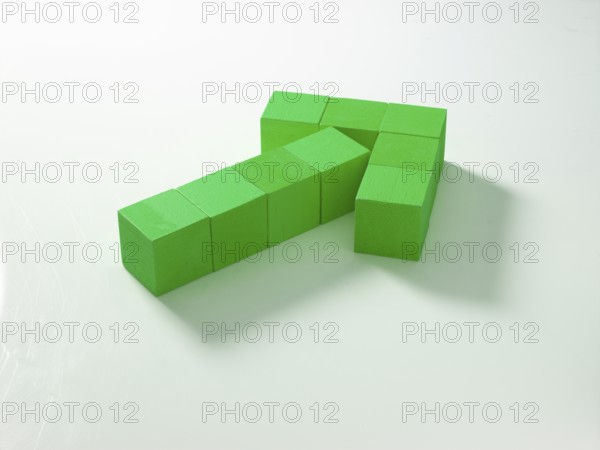 9 green wooden cubes against a white background