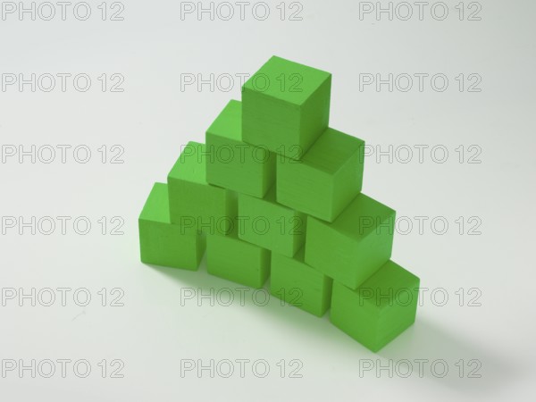 10 green wooden cubes against a white background