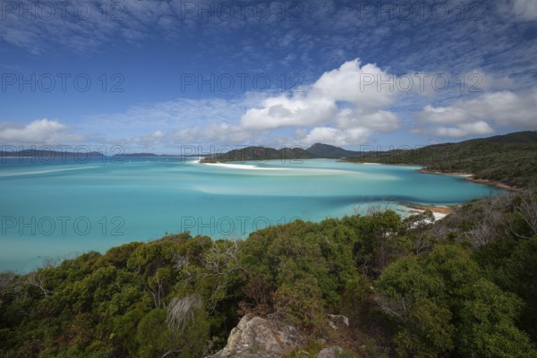 Sunny daytime view from Hill Inlet lookout over Whitehaven Beach, Whitsunday Island, Queensland, Australia