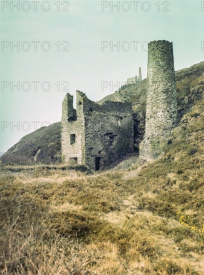 Ruins of Taylor's engine house building at Tywarnhayle United Mills copper mine, near Porthtowan, St Agnes, Cornwall, England, UK 1960s