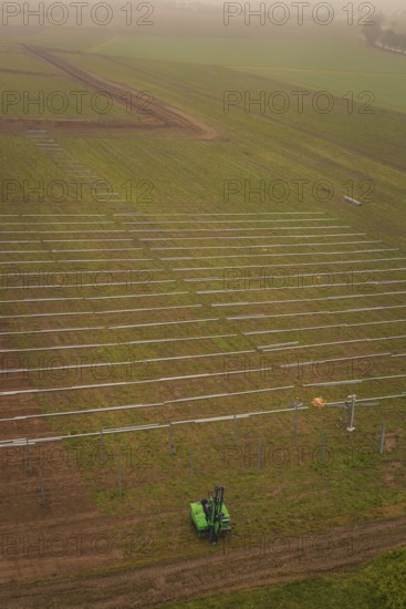 Prepared fields for solar plant construction, green environment, machine operation for installation, energy transition, construction of PV open space, Baden-Württemberg, Germany