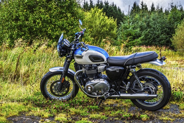 Triumph Motorcycle on the Scottish wilderness, Scotland, United Kingdom
