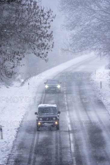 Country road in Elfringhauser Switzerland, near Sprockhövel, snowfall, snowy, North Rhine-Westphalia, Germany