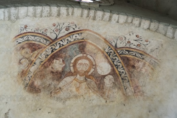 St Cyr and St Julitte's Church, roman church of Escurolles, Christ in majesty. Allier department, Auvergne Rhone Alpes, France