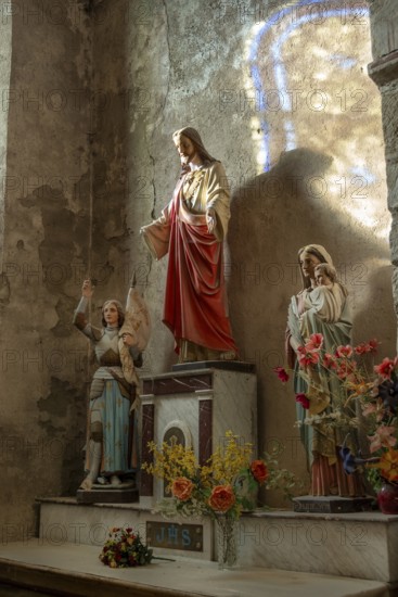 St Cyr and St Julitte's Church, roman church of Escurolles. Amtar, Allier department, Auvergne Rhone Alpes, France