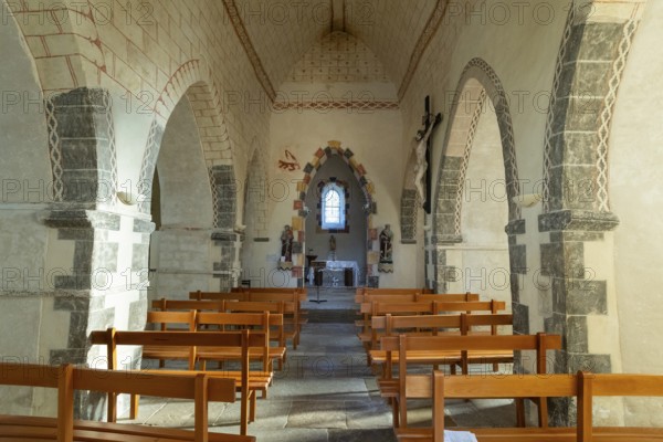 Painted church St Aignan's Church of Begues. Central nave flanked by two aisles. Allier department. Auvergne Rhone Alpes. France. Europe