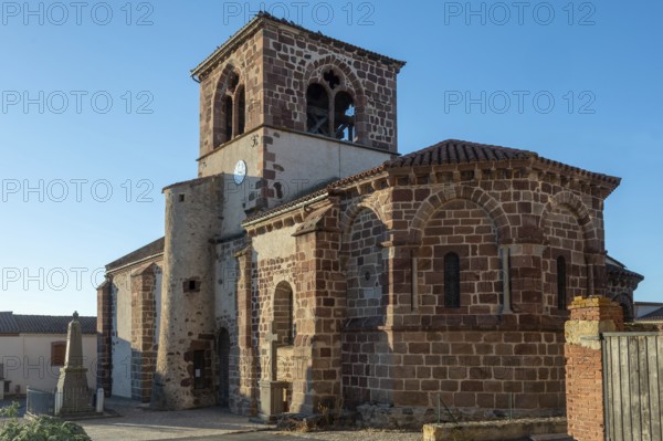Azerat village. Roman church Saint-Jean-Baptiste . Haute Loire. Auvergne Rhone Alpes. France