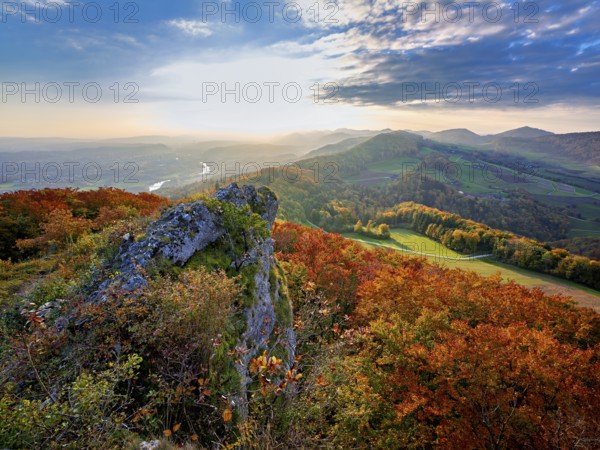 View of an autumnal forest from the Gisliflue, behind the Jura foothills with Wasserfluh and Strihen, Talheim, Canton, Aargau, Switzerland