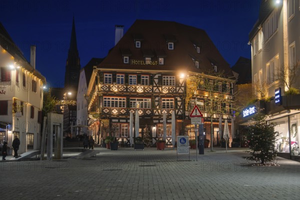 Night view of a traditionally designed half-timbered hotel in the city center, Nagold, Calw district, Black Forest, Germany