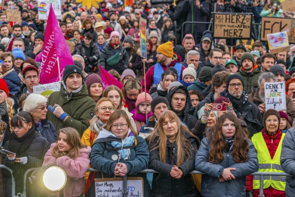 Participants with flags and posters at the demonstration against the right and for the preservation of the firewall on February 2, 2025, Republic Square in front of the Reichstag, Berlin, Germany