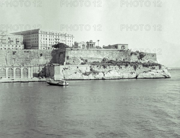 Historic buildings of waterfront and Lower Barrakka Gardens, Grand Harbour, Valletta, Malta, Europe c 1957