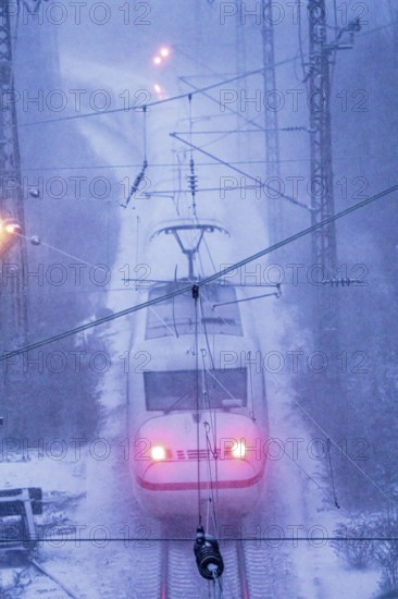 Winter weather, snowfall, ICE train, regional traffic, on the route east, in front of Essen main station, regional transport North Rhine-Westphalia, Germany
