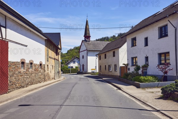 Church of St. Roch and Sebastian, general development, residential building, hill, forest, blue sky, cirrus clouds, cirrostratus clouds, street main street, Insul, Ahrweiler district, Rhineland-Palatinate, Germany