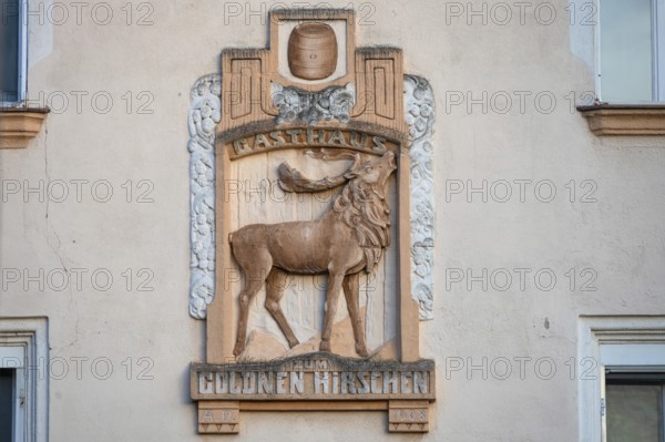 Relief of the Gasthaus Zum Goldenen Hirschen on a house façade, Fürth, Middle Franconia, Bavaria, Germany