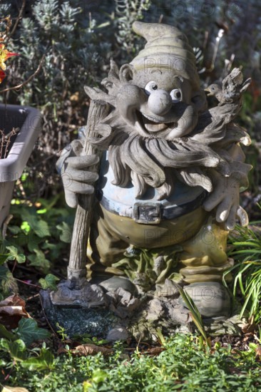 Garden gnome in a front garden, Franconia, Bavaria, Germany