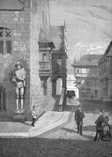 The town hall with Roland in Halberstadt in 1880, Saxony-Anhalt, Germany, A few people talking in a medieval city street in daylight, historic, authentic, digitally restored reproduction from a 19th-century model, record date not stated