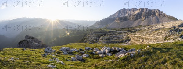 Sunset over the Adamello Group on the Grosté Plateau with Pietra Grande rock peak, Brenta Mountains, Trentino, Italy