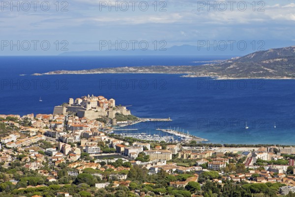 View of Calvi Citadel and Calvi Bay, in the background Cap Corse, Haute-Corse Department, Balagne, Corsica, France