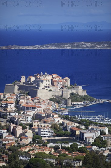 View of Calvi Citadel and Calvi Bay, in the background Cap Corse, Haute-Corse Department, Balagne, Corsica, France