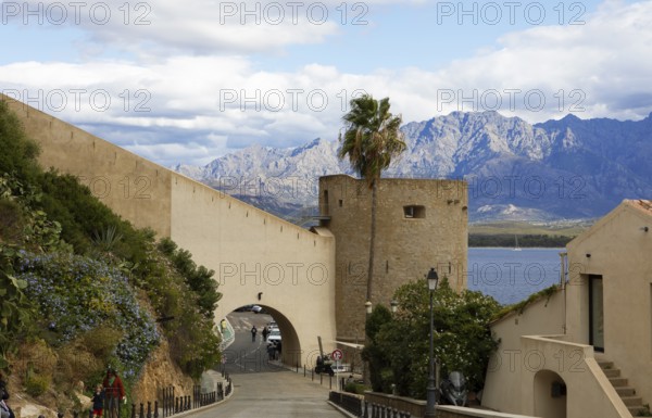Calvi citadel, with the mountains of the Balagne region in the Haute-Corse department, Corsica, France