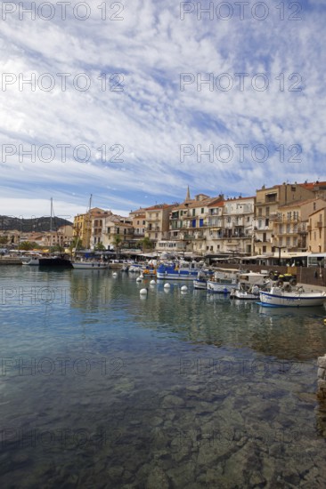 Colourful boats and restaurants in the port of Calvi, Balagne, Haute-Corse department, Corsica, France