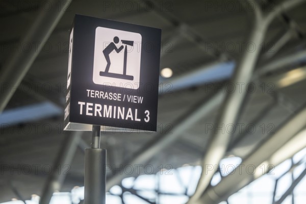 Terminal 3 at Stuttgart Airport. Pictogram viewing terrace. Visitors and aircraft spotters have a direct view of the apron and runway there. Stuttgart, Baden-Württemberg, Germany