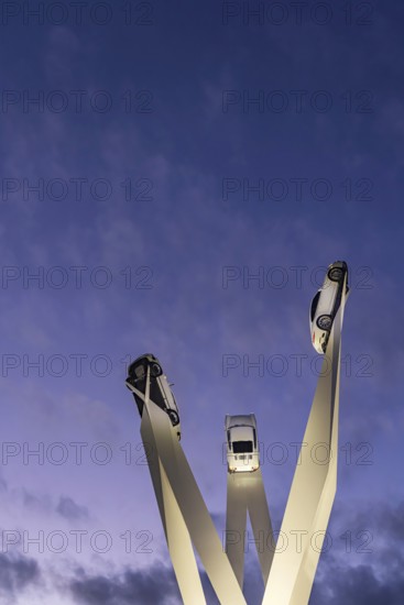 Inspiration 911 artwork by Gerry Judah in front of the Porsche headquarters on Porscheplatz: three steles, each presenting a Porsche 911 at a height of up to 24 meters. Stuttgart, Baden-Württemberg, Germany