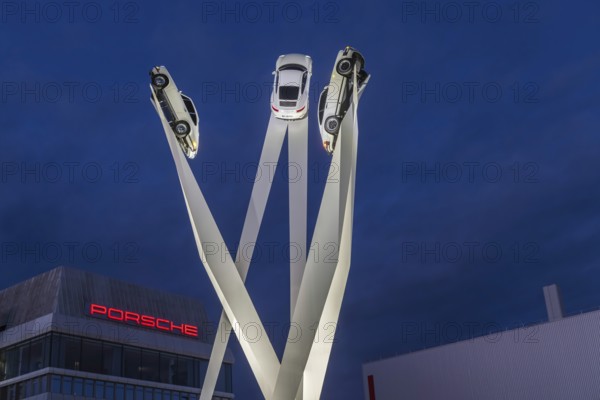 Inspiration 911 artwork by Gerry Judah in front of the Porsche headquarters on Porscheplatz: three steles, each presenting a Porsche 911 at a height of up to 24 meters. Stuttgart, Baden-Württemberg, Germany