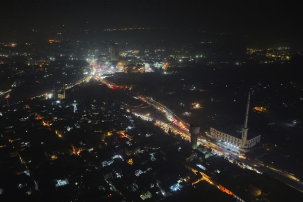 In Damascus, Syria, on December 29, 2025, nighttime drone footage shows the Syrian capital fully illuminated, capturing city lights and urban landscapes as the year comes to an end, Damascus, Damascus, Syria
