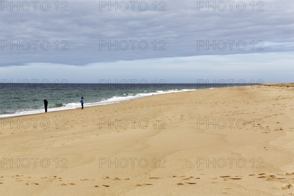 Ocean walkers, fall cloud cover, Provincetown, Race Point Beach, Cape Cod National Seashore, Atlantic Coast, Massachusetts, New England, USA