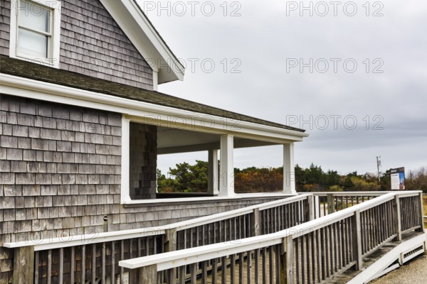 House with wooden deck, shingle façade and ramp, accessibility, typical architectural style, Highland Light, Cape Cod Light, North Truro, Cape Cod, Massachusetts, New England, USA
