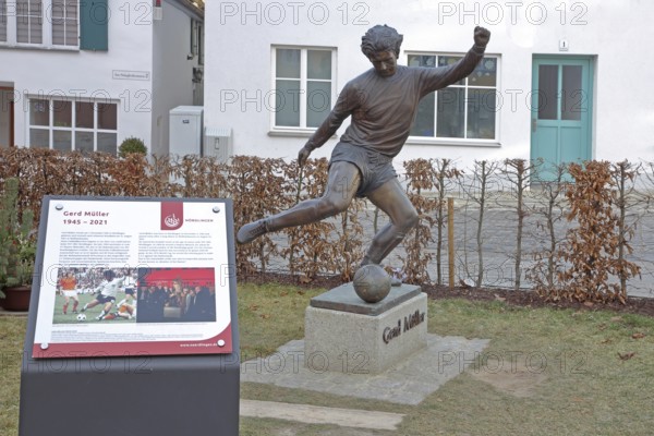Memorial to soccer player Gerd Müller, German national team player, soccer legend, bronze sculpture, inscription, Gerd-Müller-Platz, Nördlingen, Bavaria, Germany